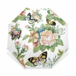 Paraguas infantil de tres pliegues con flores de colores y mariposas sobre fondo blanco