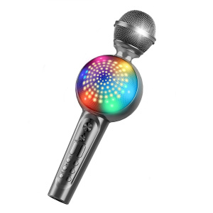 Un micrófono de karaoke inalámbrico gris para niños con un altavoz central multicolor